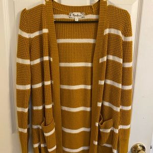 mustard sweater with white stripes